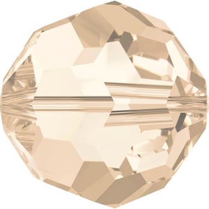 May include: A round, faceted crystal bead in a light beige color. The bead has a smooth, polished surface and is designed for jewelry making.