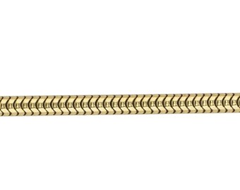 May include: A gold snake chain necklace. The chain is made of small, interlocking links that create a smooth, flowing look.