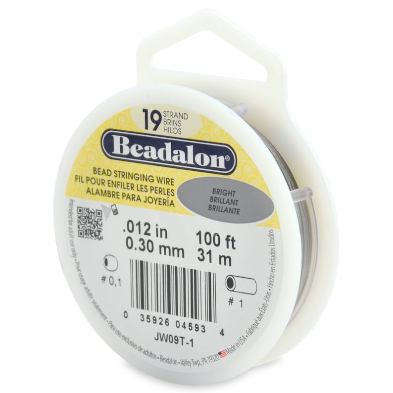 May include: A spool of 19 strand Beadalon bead stringing wire in a clear plastic container with a white label. The label says .012 in 0.30 mm 100 ft 31 m, Bright, Brillant, Brillante, JW09T-1, and has a barcode.