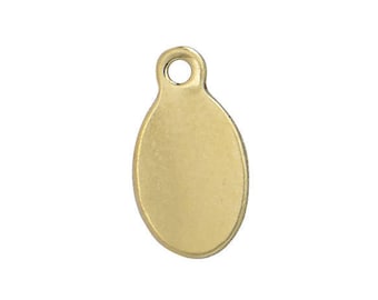 May include: A gold oval-shaped metal tag with a hole at the top.