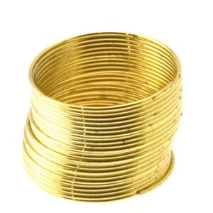 May include: A stack of gold-colored metal rings, each ring is thin and smooth. The rings are stacked on top of each other, creating a cylindrical shape.