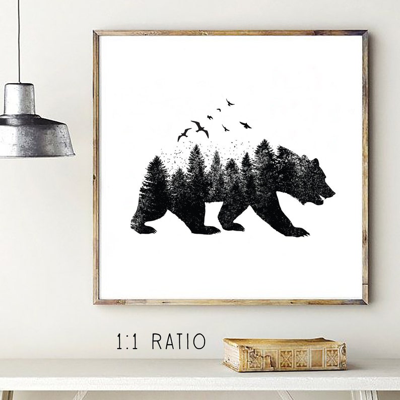 May include: Black and white illustration of a bear silhouette with a forest inside. The bear is walking to the right and there are birds flying above the forest.