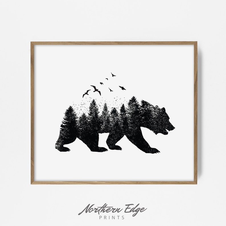 May include: Black and white illustration of a bear silhouette with a forest inside. Birds fly above the bear.