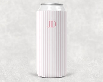May include: A white and pink striped can cooler with the initials "JD" in pink.