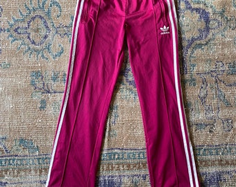 black and hot pink adidas pants