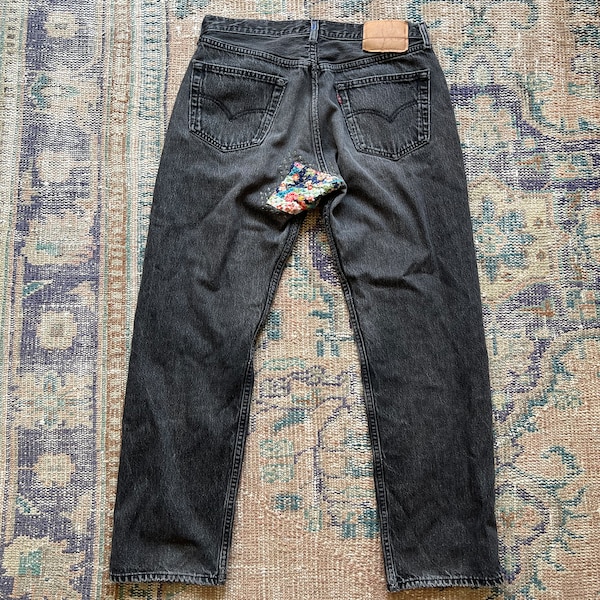 90’s Levis 501 black jeans with sashiko patchwork mending