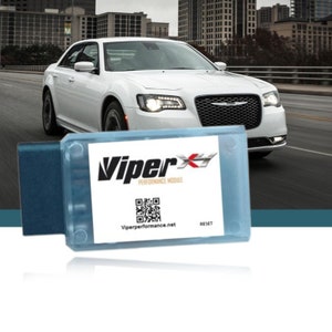 Może przedstawiać: Niebiesko-biały moduł Viper X Performance z kodem QR i tekstem "Viperperformance.net" oraz "Reset".