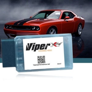 May include: A white ViperX Performance Module with a black and white QR code and the text "ViperX Performance Module" and "Viperperformance.net". The module has a blue connector and a reset button.