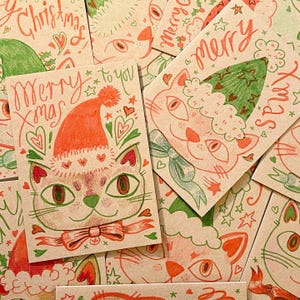 Cartões de Natal desenhados à mão com gatos fofos em cartão reciclado ecológico