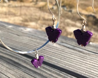 Sterling silver bangle bracelet with purple stone butterfly dangle and matching earrings.