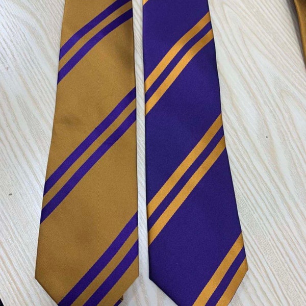 Purple w/Gold strips or Gold w/Purple Strips. (Select which Tie you want, put in note please) 15.00 each (adult size ties)