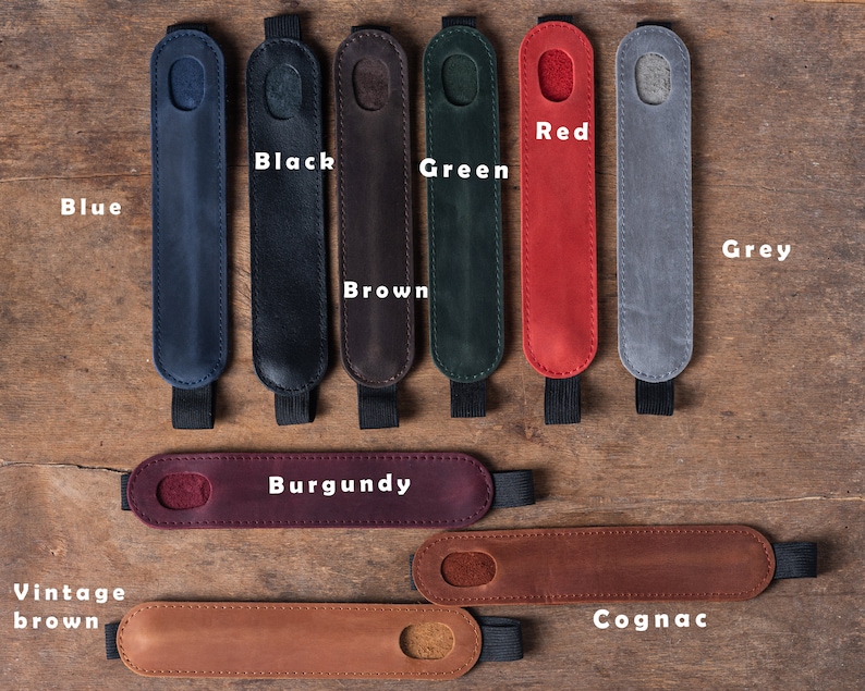 May include: Assortment of leather pen sleeves in various colors, including blue, black, brown, green, red, grey, burgundy, vintage brown, and cognac.