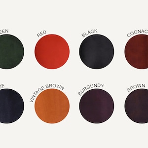 May include: Color chart showing ten different leather colors: green, red, black, cognac, blue, vintage brown, burgundy, brown, dark brown, and light brown.