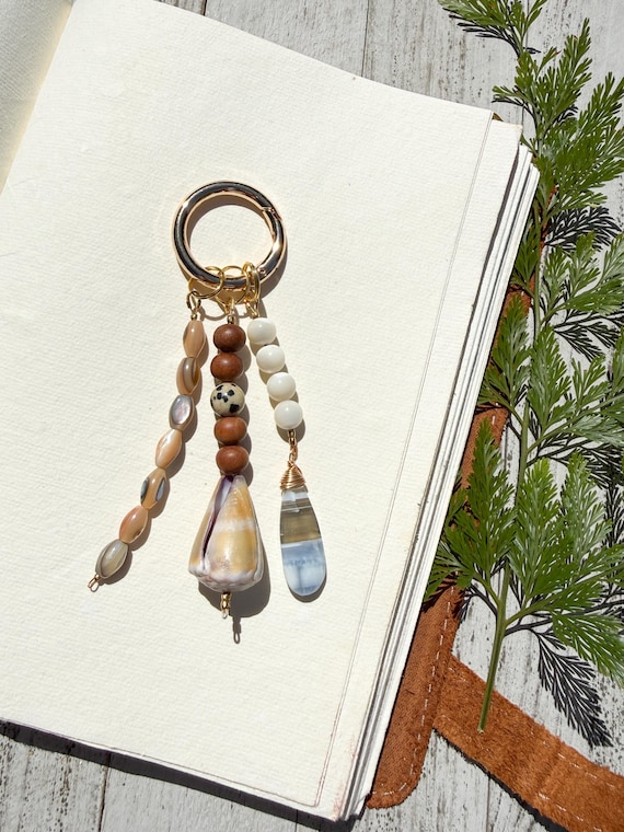 Seaside 3 Strand Bag Charm with Sandalwood, Hawaiian Cone Shell, Oregon Owyhee Opal, Dalmatian Jasper, and Mother of Pearl