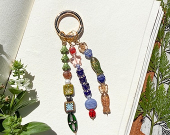 Whimsy Bag Charm with 3 Strands of Vintage Czech Glass Motifs: Fish, Green Oval, Ladybug + Pearls