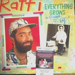 OMG! JSA-certifierad signerad Raffi Everything Grows originalpressad vinylskiva med textblad, innerfodral, autograf, äkthetsintyg