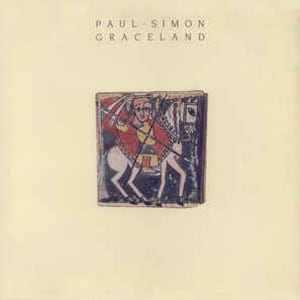 May include: A vintage album cover with a white background and the title "PAUL SIMON GRACELAND" in black text. The cover art features a colorful illustration of a person riding a horse.