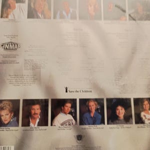 May include: Back cover of a music album featuring a group of singers. The album is titled "Save the Children" and features a photo of each singer. The album is produced by Cinmar.