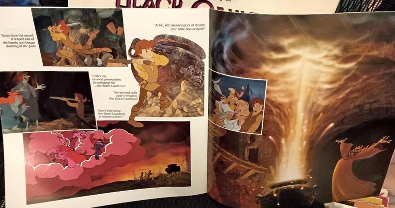 May include: A vintage children's book illustration featuring scenes from a fantasy story. The artwork includes characters in action, with text bubbles and a dramatic, colorful style. The pages are open, showcasing multiple panels.