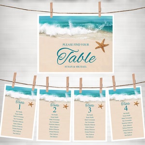 May include: Four table cards with a beach scene and a starfish. Each card has a table number, a list of names, and the text "Please find your table".