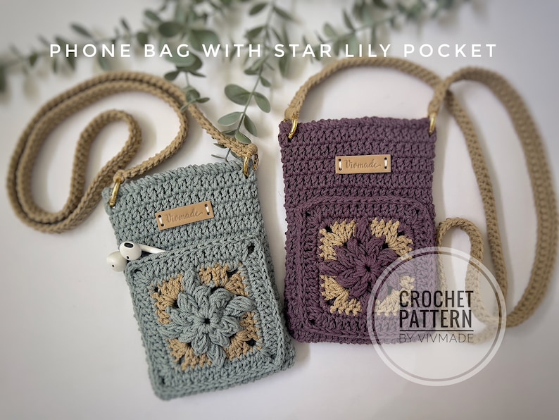 May include: Two crocheted phone bags with star lily pockets. The bags are made with a light blue and a purple yarn. Both bags have a brown leather label that says "Vivmade". The bags have a brown strap. The text "CROCHET PATTERN BY VIVMADE" is visible in the bottom right corner of the image.