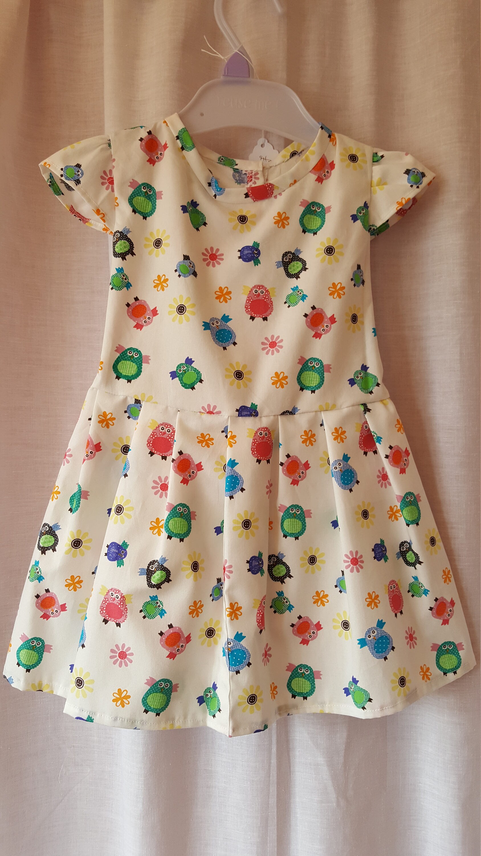 Child's dress handmade in distinctive classic style from quality fabric
