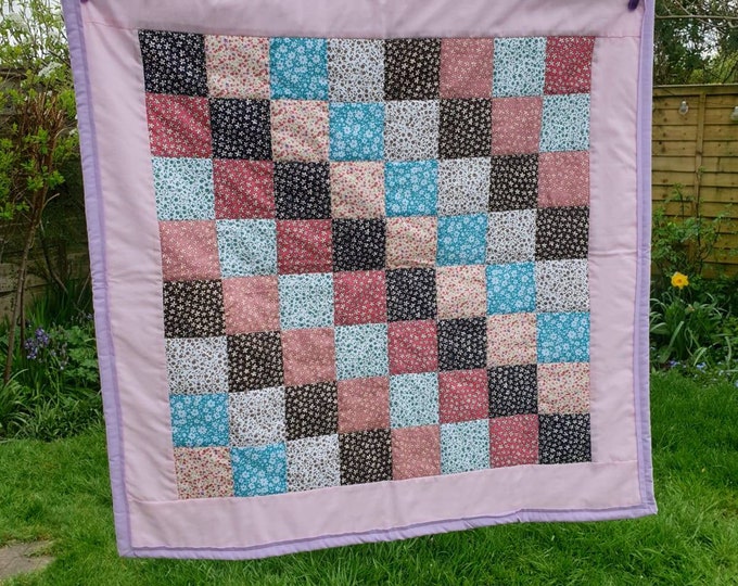 Handmade patchwork quilt approx 85cm square, multicoloured print quilt, lilac trimmed quilt, multipurpose quilt, patchwork throw, baby quilt