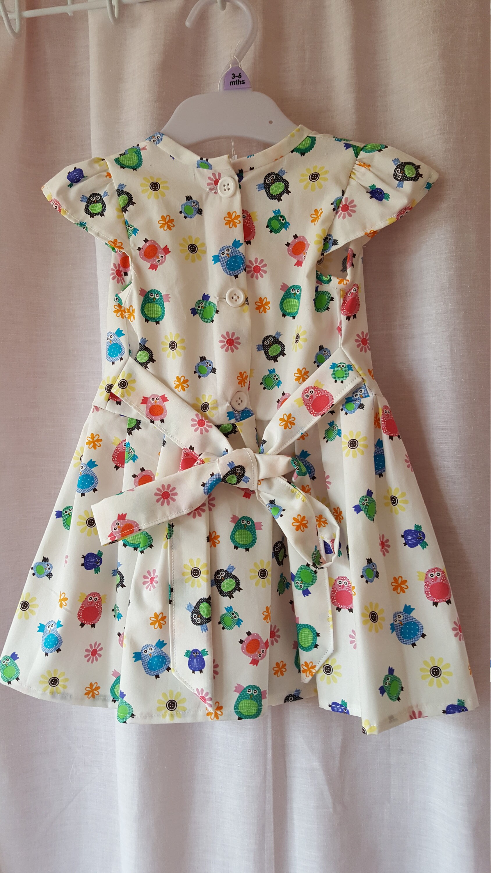 Child's dress handmade in distinctive classic style from quality fabric suitable for all occasions