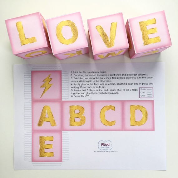 pink letter blocks