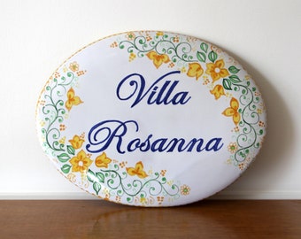floral oval sign