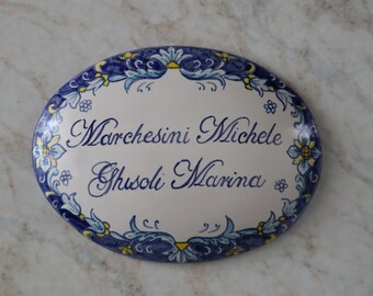 baroque oval sign