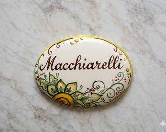 floral oval sign
