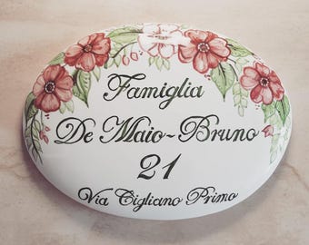 floral oval sign
