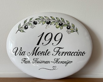 floral oval sign