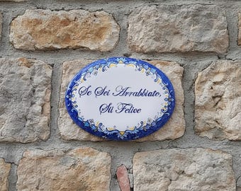 baroque oval sign