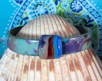 Lampwork bead and printed leather bracelet