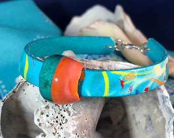 Lampwork bead and printed leather bracelet
