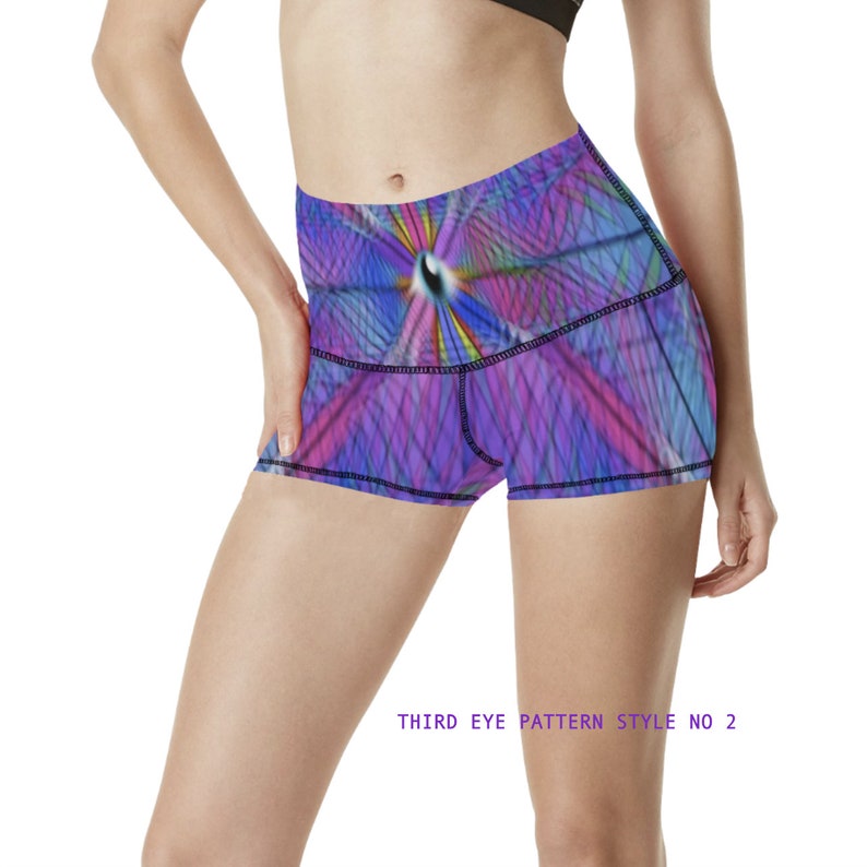 May include: Purple and blue athletic shorts with a colorful geometric pattern and the text "THIRD EYE PATTERN STYLE NO 2".