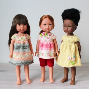 Knitting pattern for Vestida de Azul Carlota Dolls and Carlota’s Friends dolls (11"/28cm). Pattern for top, dress and shorts.