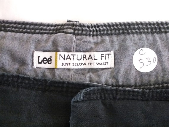 lee natural fit just below the waist