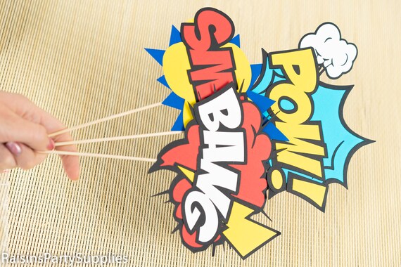 Superhero birthday decorations Superhero party table centerpieces Comics call outs on picks Super hero centerpieces Superhero birthday party Il_570xn