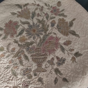 Vintage chair cover powdery colors used Boudoir shabby look