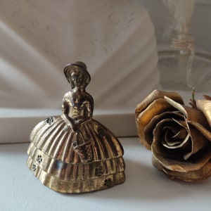 Old vintage brass bell Biedermeier lady with barge hat and crinoline bell aged patina table bell Made in England Victorian style