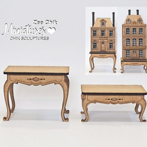 May include: Two wooden tables with intricate carvings and curved legs. The larger table is 18 inches wide and 12 inches deep. The smaller table is 12 inches wide and 8 inches deep. Both tables are made of unfinished wood and are ready to be painted or stained.