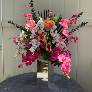 Silk Floral Design Mirrored Vase Pink Gladiolus White Wisterias Fan Palm Rose And Plum Orchids Calla Lilies Ivy And Green Branches Large.