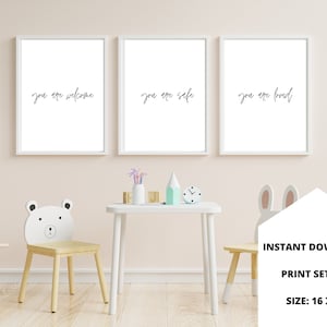 May include: Set of three printable wall art prints with white frames. The prints feature the text "you are welcome", "you are safe", and "you are loved" in black calligraphy. The prints are 40.6 cm by 50.8 cm.