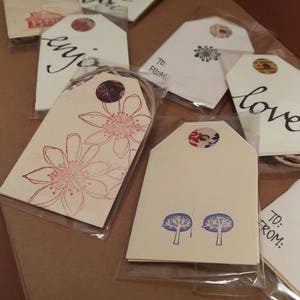Confezione da n. 4 tag