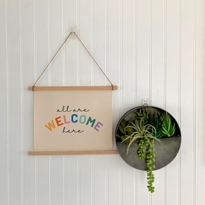 All Are Welcome Here Scroll Sign - Boho