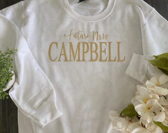 Bride Crewneck Sweatshirt White Gold Lettering Custom Bridal Top Engagement Announcement Clothing Personalized Wedding Shirt Future Mrs
