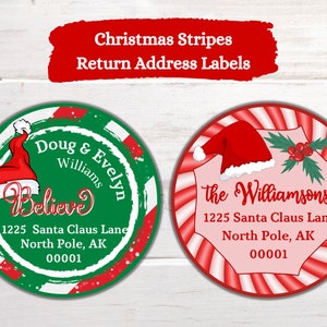 May include: Two round Christmas-themed return address labels. The first label has a green background with red and white stripes and a Santa hat. The text reads "Doug & Evelyn Williams Believe 1225 Santa Claus Lane North Pole, AK 00001". The second label has a pink background with red and white candy cane stripes and a Santa hat. The text reads "the Williamsons 1225 Santa Claus Lane North Pole, AK 00001".